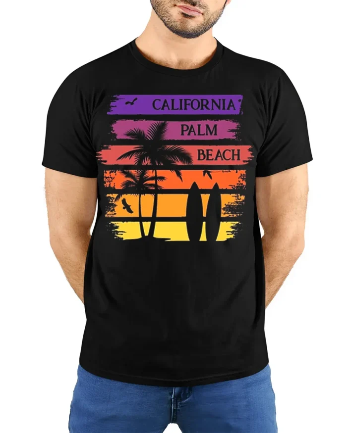 California Palm Beach Sunset Surf Graphic T-shirt - model wearing black shirt, hands behind back