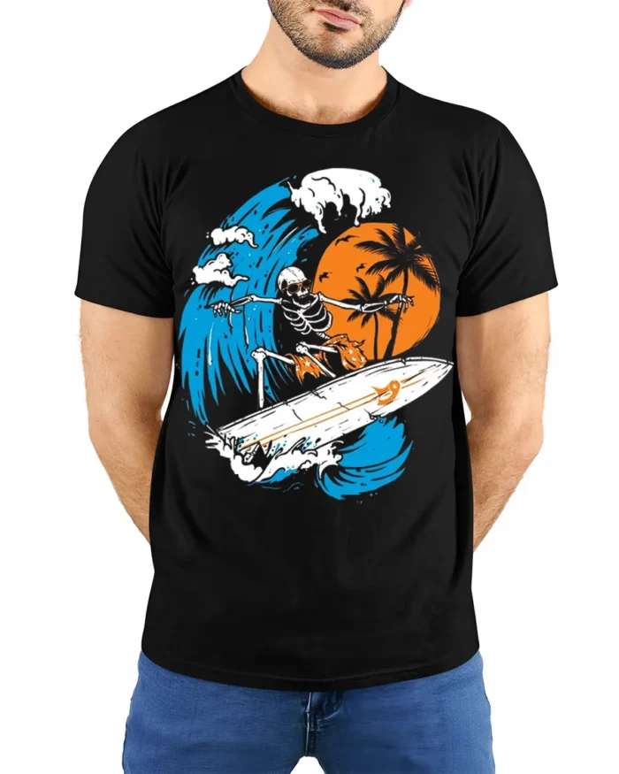Skeleton Surfing Big Wave Sunset Graphic T-shirt - model wearing black shirt, hands behind back