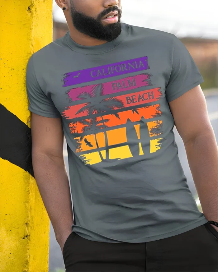 California Palm Beach Sunset Surf Graphic T-shirt - model in grey shirt leaning against column
