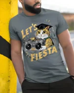 Graduation Cat Let’s Fiesta Funny Party T-shirt - model in grey shirt leaning against column