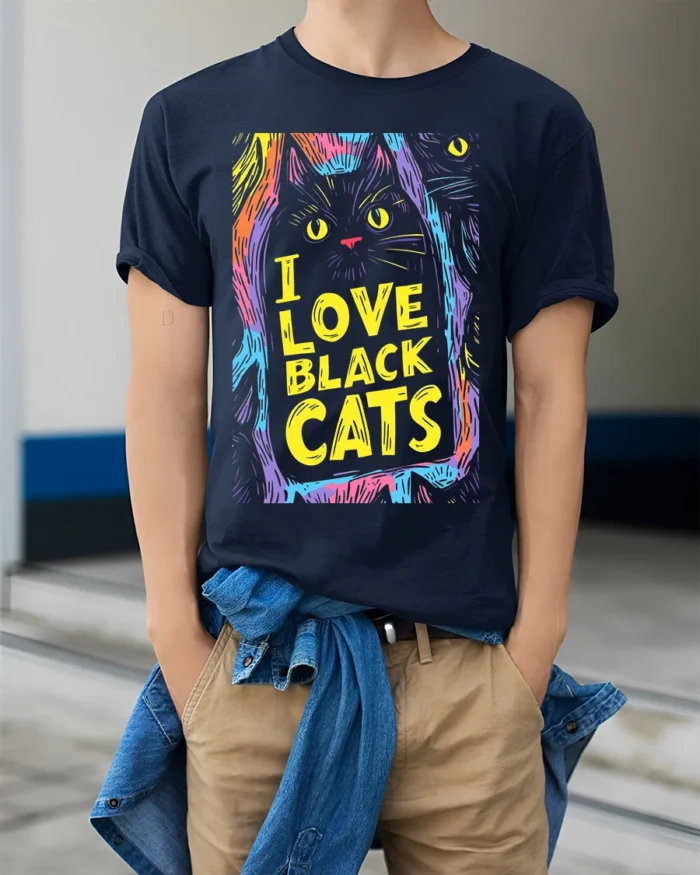 I Love Black Cats Colorful Halloween T-shirt - model wearing navy shirt, hands in pockets