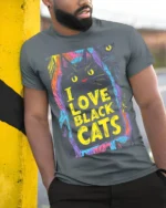 I Love Black Cats Colorful Halloween T-shirt - model in grey shirt leaning against column