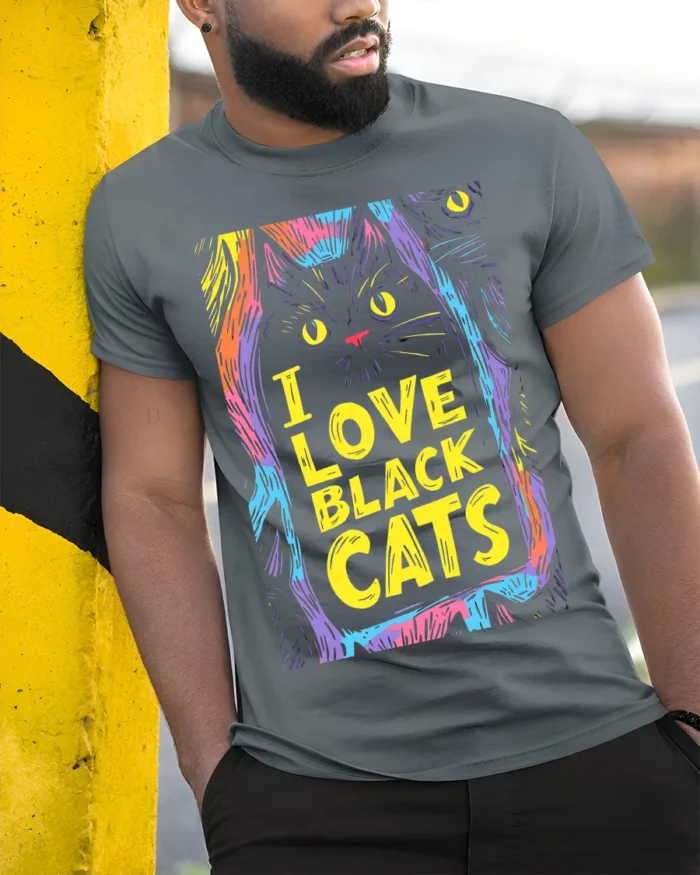 I Love Black Cats Colorful Halloween T-shirt - model in grey shirt leaning against column