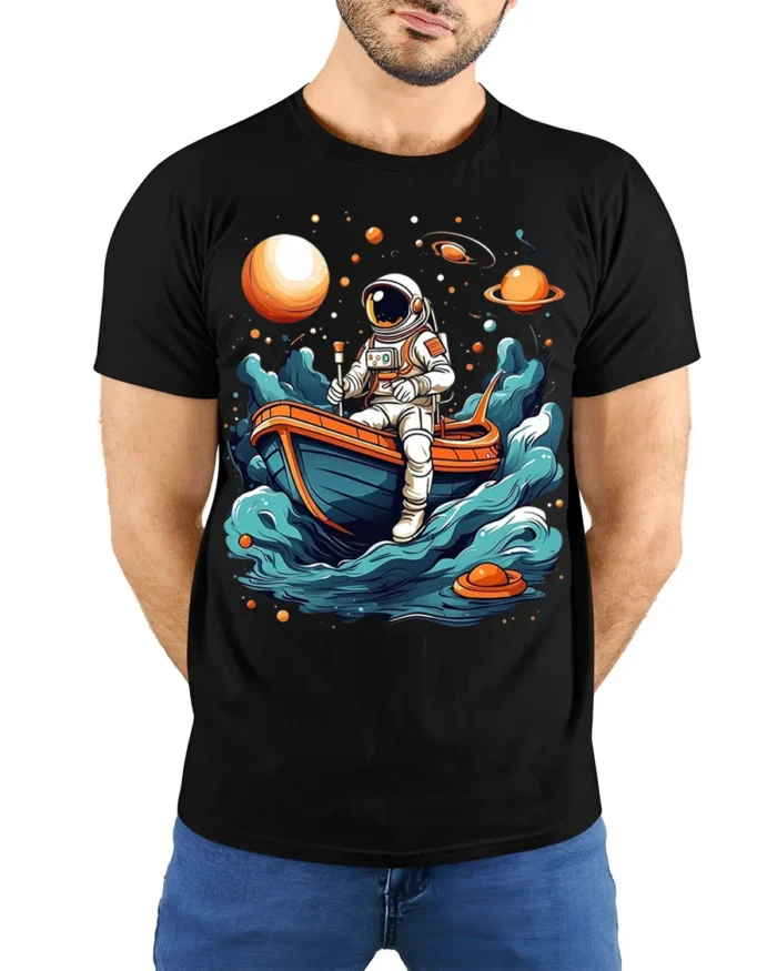 Astronaut Rowing Boat Space Adventure Graphic T-shirt - model wearing black shirt, hands behind back