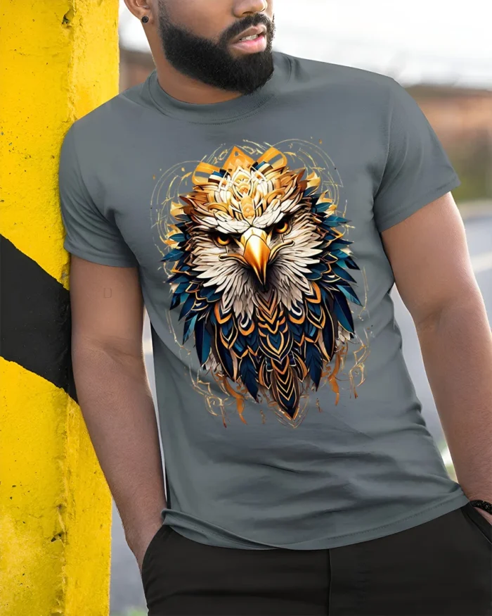 Fierce Eagle Head Tribal Feathers Art T-shirt - model in grey shirt leaning against column