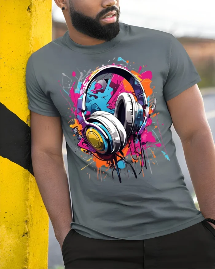 Colorful Headphones Music Splash Graphic T-shirt - model in grey shirt leaning against column