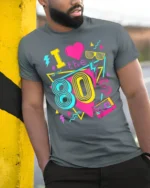 Retro I Love The 80s Neon Cassette Graphic T-shirt - model in grey shirt leaning against column