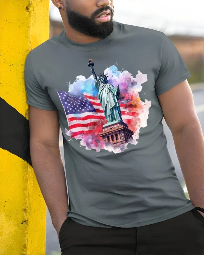 Statue of Liberty American Flag Patriotic T-shirt - model in grey shirt leaning against column