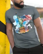 Statue of Liberty NYC Skyline American Flag T-shirt - model in grey shirt leaning against column