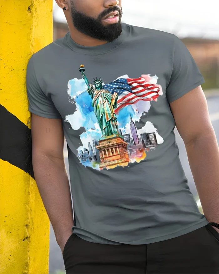 Statue of Liberty NYC Skyline American Flag T-shirt - model in grey shirt leaning against column