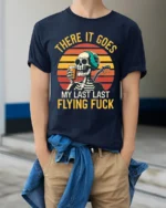 Skeleton Retro Sunset Funny Drinking Graphic T-Shirt - model wearing navy shirt, hands in pockets