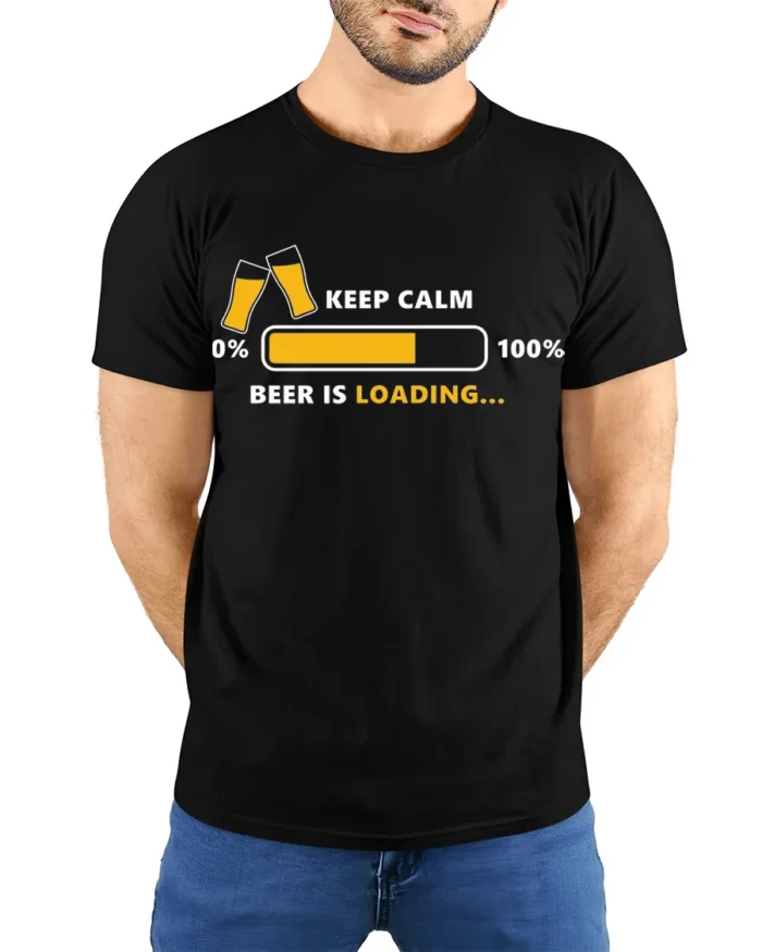 Keep Calm Beer Is Loading Funny Drinking T-Shirt - model wearing black shirt, hands behind back