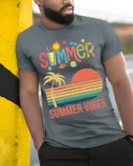 Summer Vibes Retro Sunset Palm Tree T-Shirt - model in grey shirt leaning against column