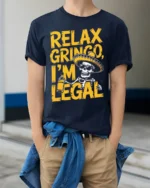 Funny Relax Gringo I’m Legal Skeleton Beer T-Shirt - model wearing navy shirt, hands in pockets