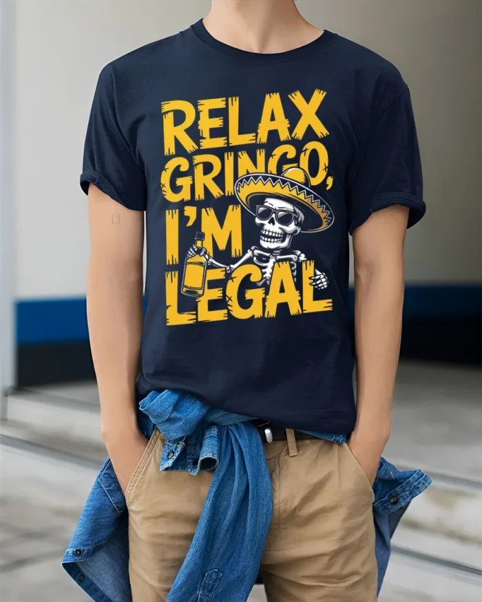 Funny Relax Gringo I’m Legal Skeleton Beer T-Shirt - model wearing navy shirt, hands in pockets