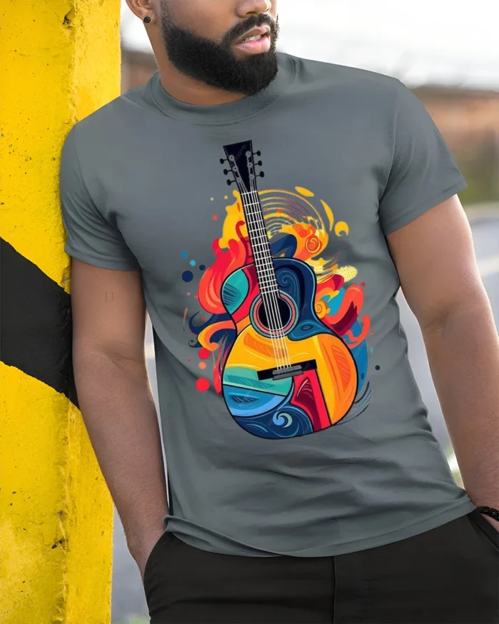 Colorful Guitar Graphic T-Shirt Music Lover Tee - model in grey shirt leaning against column