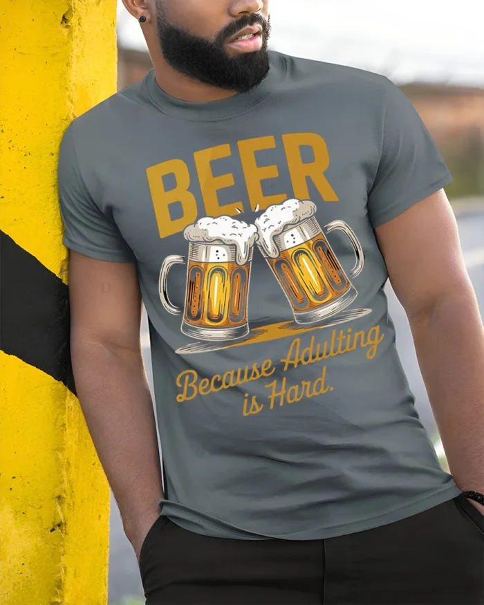 Funny Beer Adulting Is Hard T-Shirt Drinking Tee - model in grey shirt leaning against column