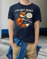 Funny Fox I’m Not Quiet I’m Plotting Graphic T-shirt - model wearing navy shirt, hands in pockets