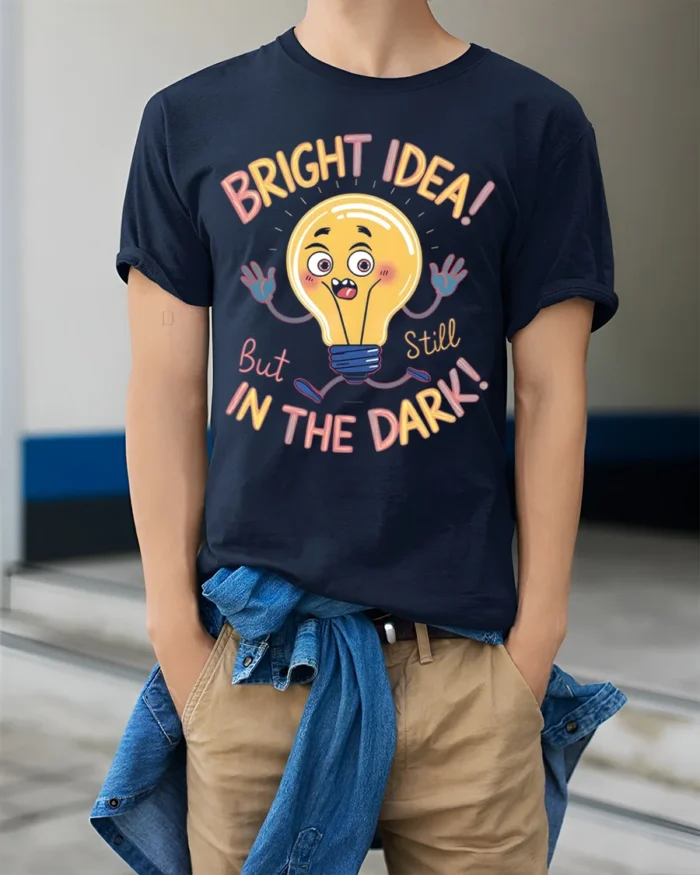 Funny Bright Idea Light Bulb Cartoon T-shirt - model wearing navy shirt, hands in pockets