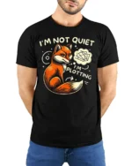 Funny Fox I’m Not Quiet I’m Plotting Graphic T-shirt - model wearing black shirt, hands behind back