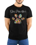 Stay Pawsitive Floral Paw Print T-Shirt - model wearing black shirt, hands behind back