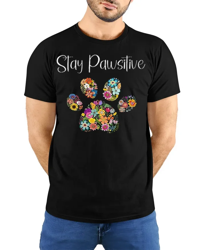 Stay Pawsitive Floral Paw Print T-Shirt - model wearing black shirt, hands behind back