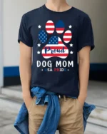 Proud Dog Mom USA Flag Paw Print Graphic T-Shirt - model wearing navy shirt, hands in pockets