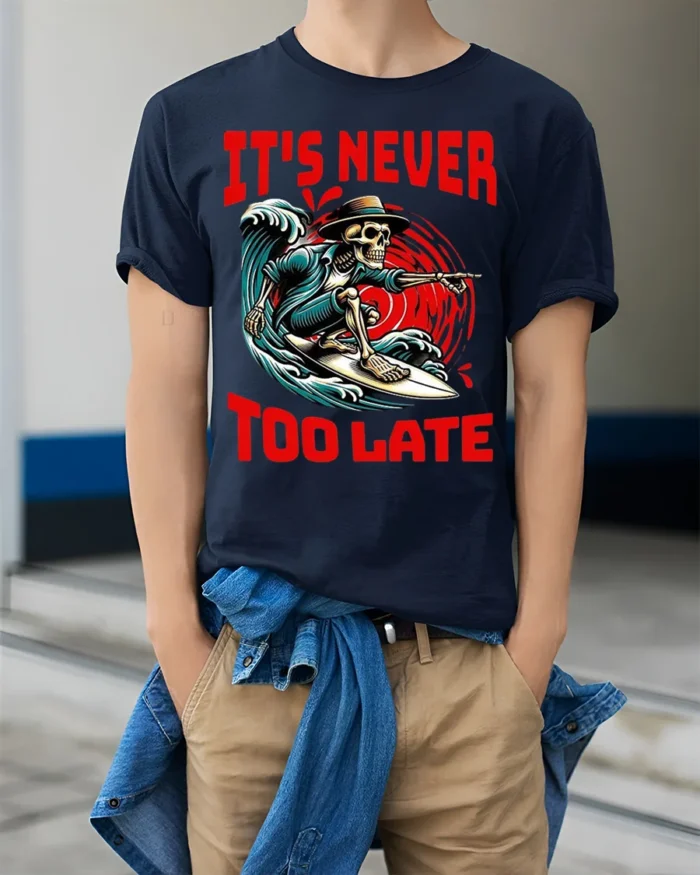 It’s Never Too Late Skeleton Surfer Graphic T-Shirt - model wearing navy shirt, hands in pockets