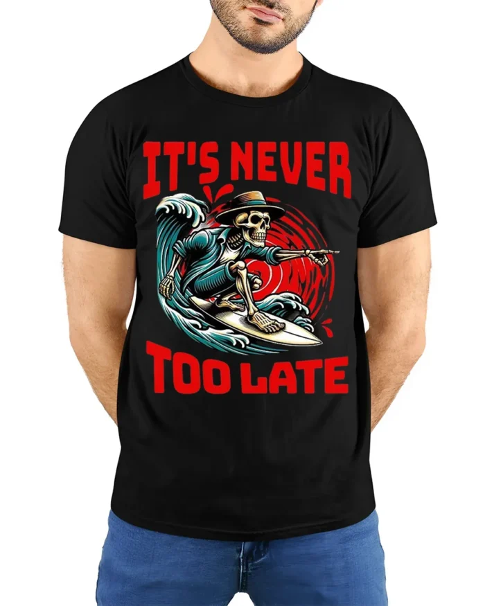 It’s Never Too Late Skeleton Surfer Graphic T-Shirt - model wearing black shirt, hands behind back