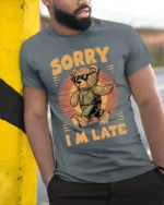 Cool Bear Sorry I’m Late Funny Graphic T-Shirt - model in grey shirt leaning against column
