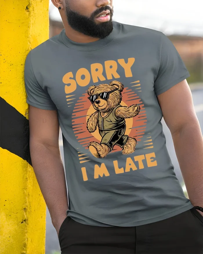 Cool Bear Sorry I’m Late Funny Graphic T-Shirt - model in grey shirt leaning against column