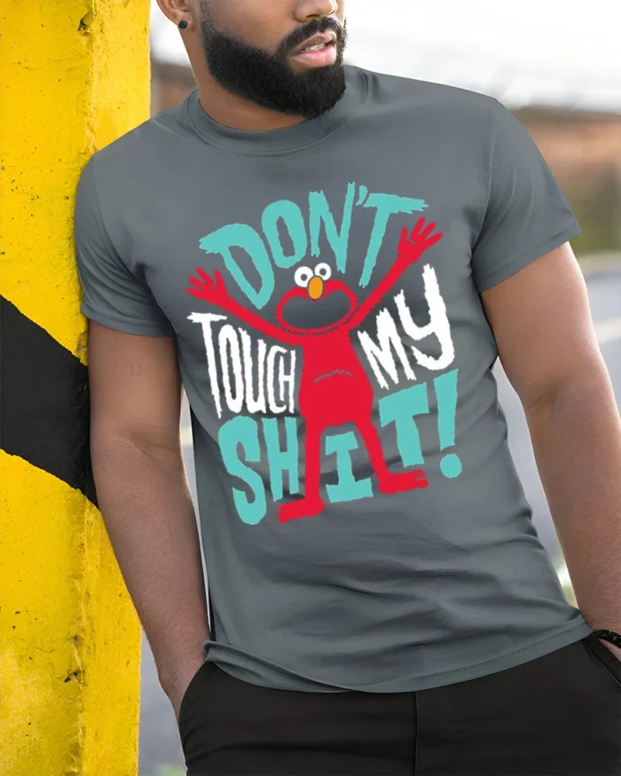 Funny Red Monster Don’t Touch My Stuff T-Shirt - model in grey shirt leaning against column