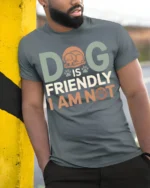 Funny Dog Is Friendly I Am Not Graphic T-Shirt - model in grey shirt leaning against column