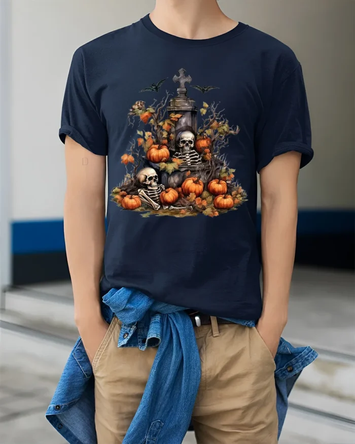 Halloween Skeleton Graveyard Pumpkin T-Shirt - model wearing navy shirt, hands in pockets