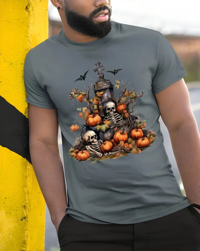 Halloween Skeleton Graveyard Pumpkin T-Shirt - model in grey shirt leaning against column
