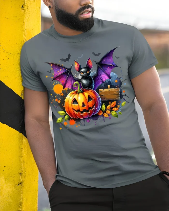 Halloween Bat and Pumpkin Graphic T-Shirt - model in grey shirt leaning against column