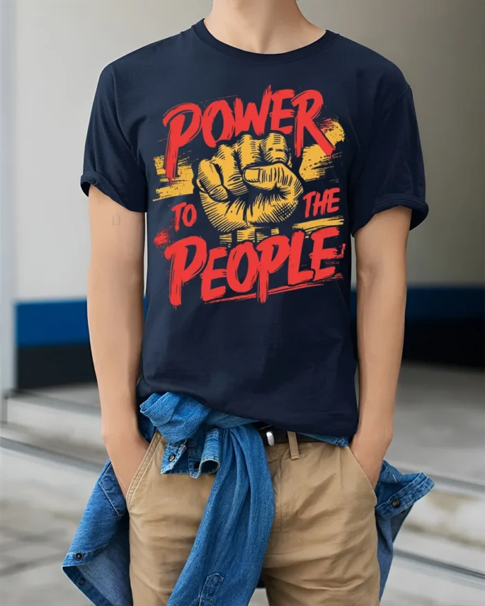 Power To The People Raised Fist Graphic T-Shirt - model wearing navy shirt, hands in pockets