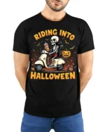 Riding Into Halloween Skeleton Scooter T-Shirt - model wearing black shirt, hands behind back