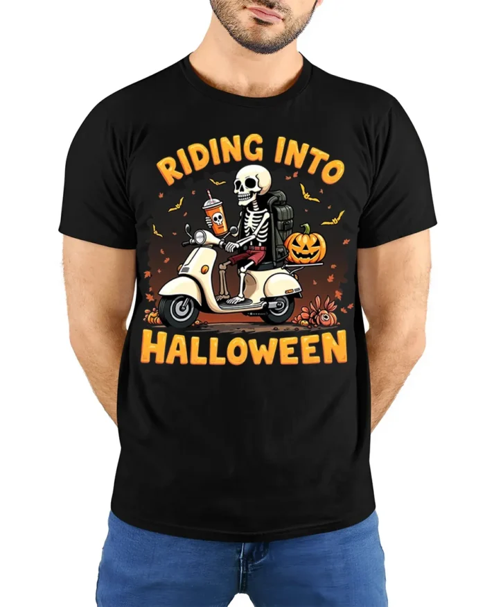 Riding Into Halloween Skeleton Scooter T-Shirt - model wearing black shirt, hands behind back