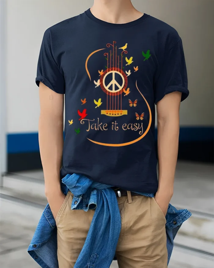 Peace Guitar Take It Easy Music T-Shirt - model wearing navy shirt, hands in pockets