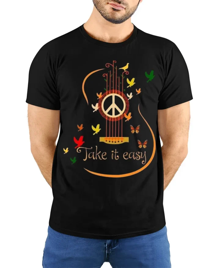 Peace Guitar Take It Easy Music T-Shirt - model wearing black shirt, hands behind back