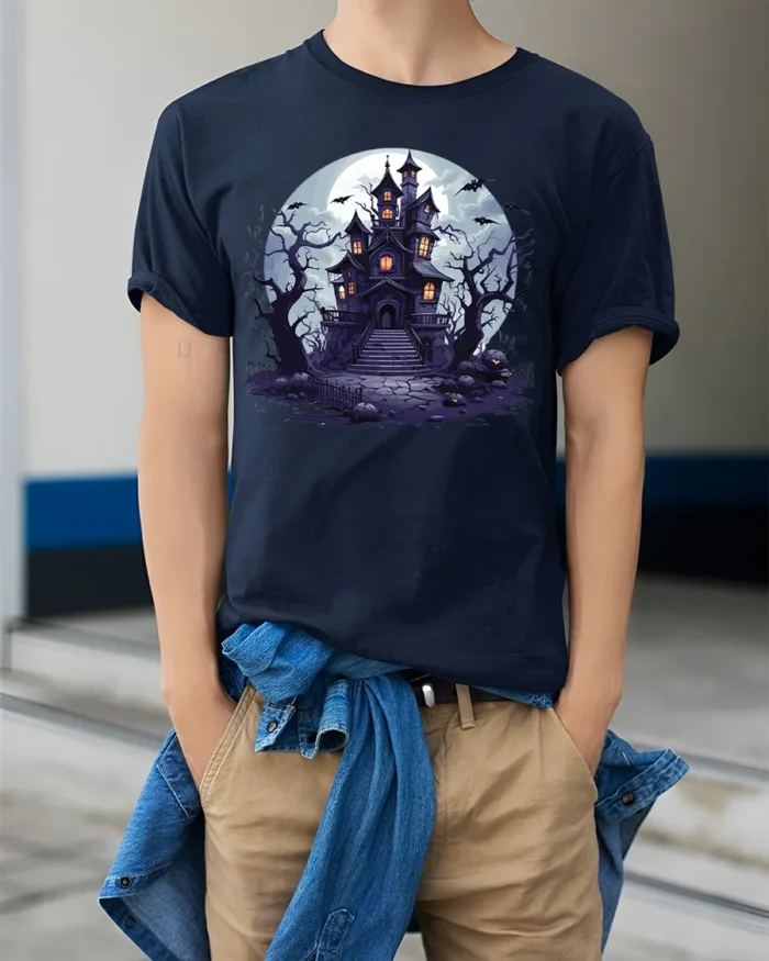 Halloween Haunted House T-Shirt Spooky Night Scene - model wearing navy shirt, hands in pockets