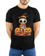 Halloween Cute Skeleton T-Shirt with Pumpkin Duo - model wearing black shirt, hands behind back