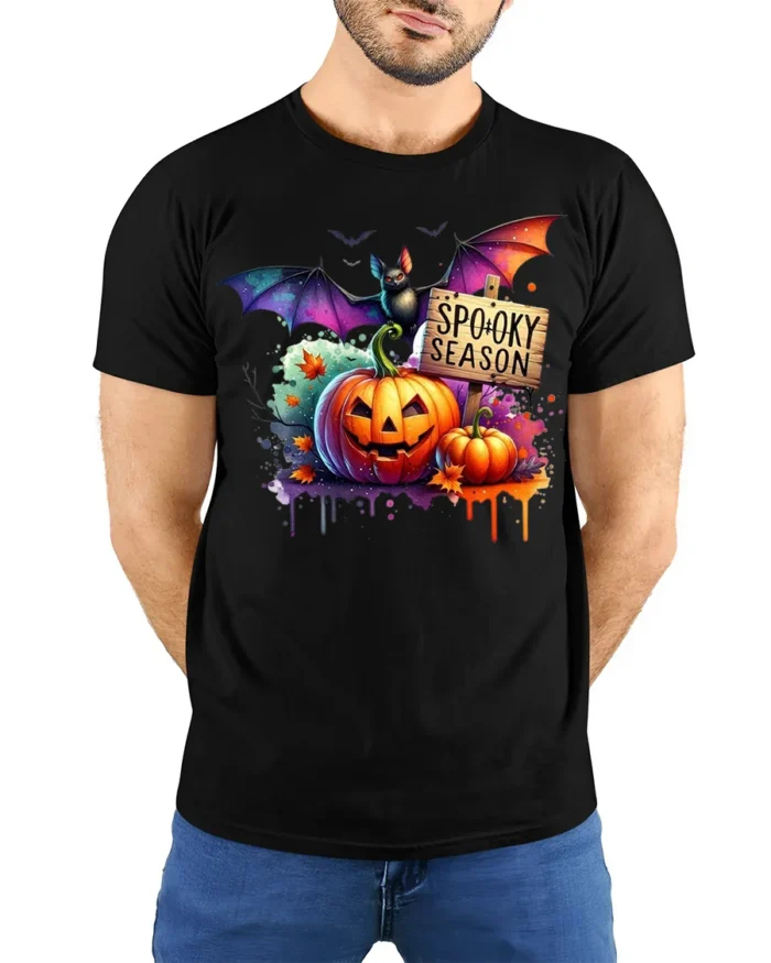 Halloween Spooky Season T-Shirt with Pumpkin Bat - model wearing black shirt, hands behind back
