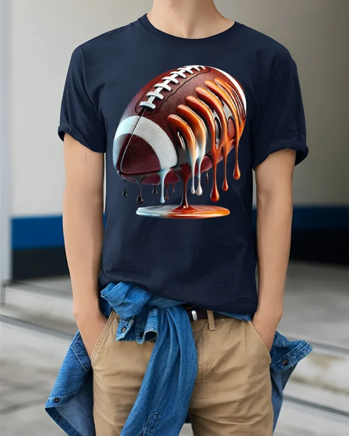 Dripping Football Game Day Graphic T-Shirt Black - model wearing navy shirt, hands in pockets
