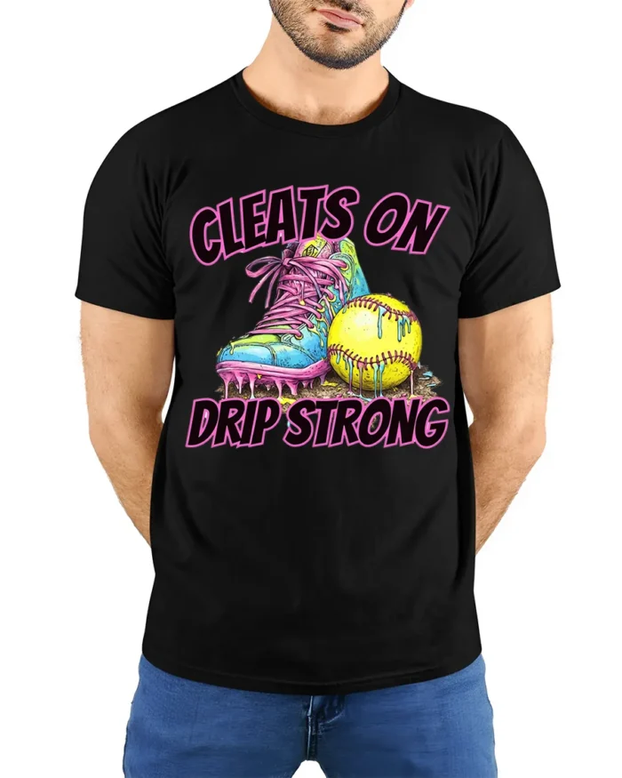 Cleats On Drip Strong Softball Graphic T-Shirt Black - model wearing black shirt, hands behind back