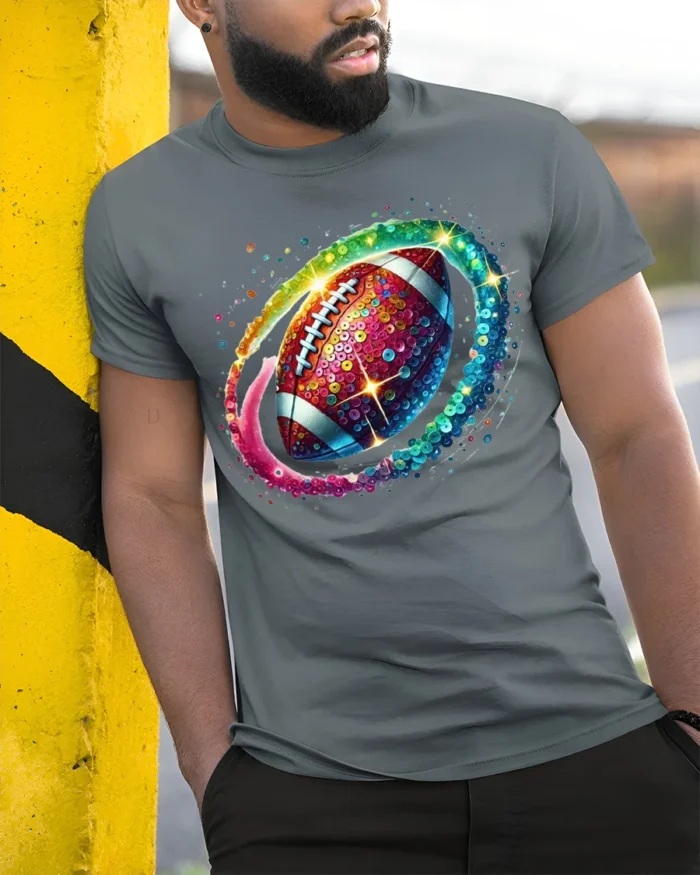 Rainbow Sequin Football Sparkle Graphic T-Shirt Black - model in grey shirt leaning against column