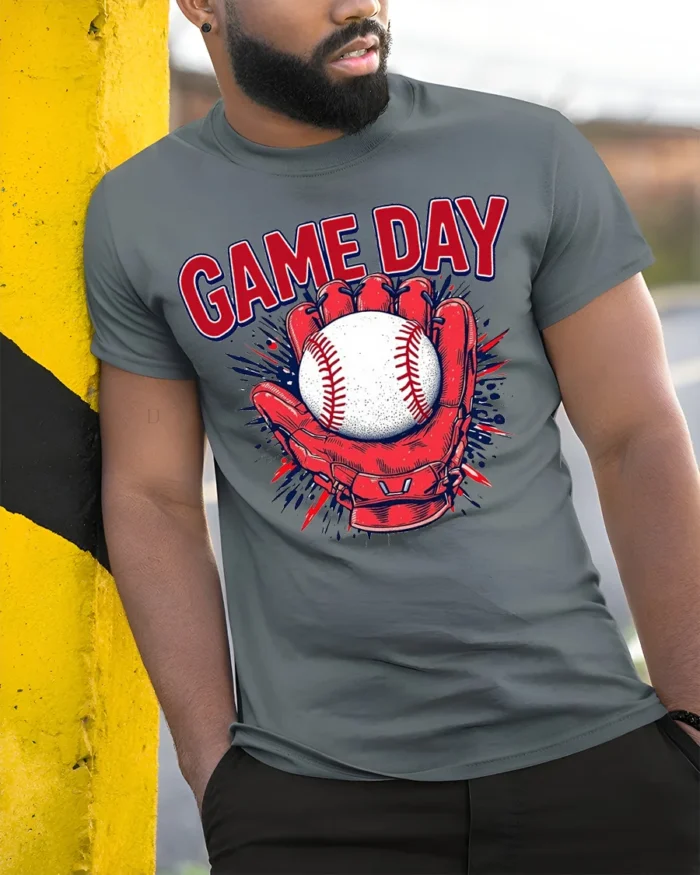 Game Day Baseball Glove and Ball Graphic T-Shirt - model in grey shirt leaning against column