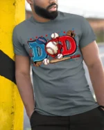 Baseball Dad Sports Glove and Bat Graphic T-Shirt - model in grey shirt leaning against column