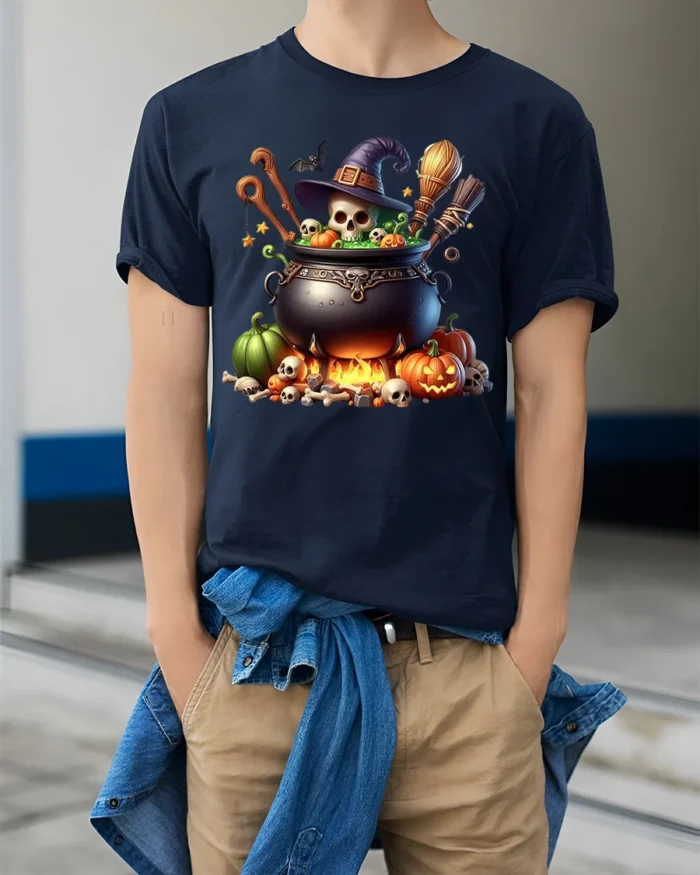 Witch Cauldron Skull Pumpkin Halloween T-shirt - model wearing navy shirt, hands in pockets